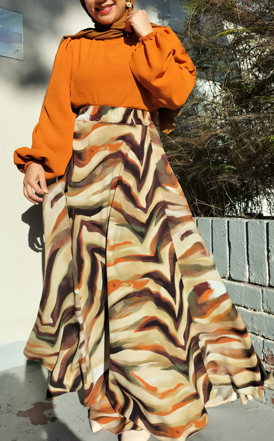 A person wearing a modest blouse and skirt set